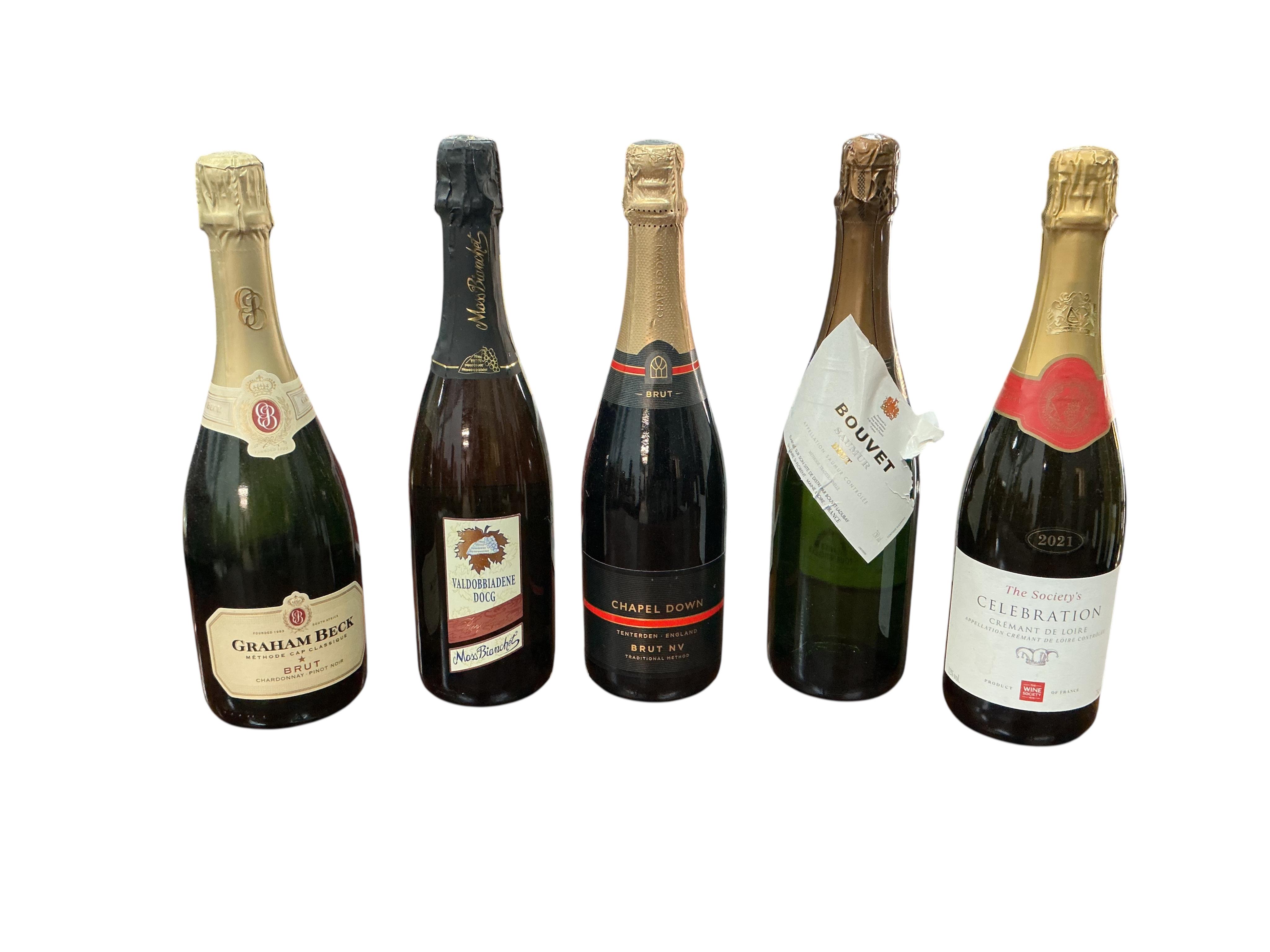 Twelve bottles of assorted wine and champagne to include Chapel Down Brut NV. (Provenance, surplus stock from a local wedding company)